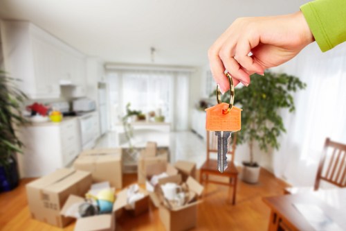 Team of professionals unpacking and organizing a home